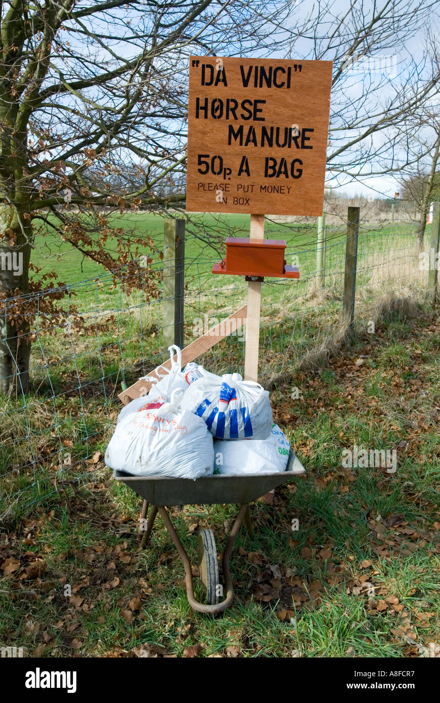 Horse manure for sale in farm beside Rosslyn Chapel using Da Vinci Code as marketing slogan