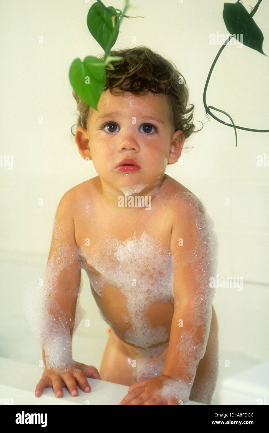 Cute baby boy takes bubble bath. USA Stock Photo - Alamy
