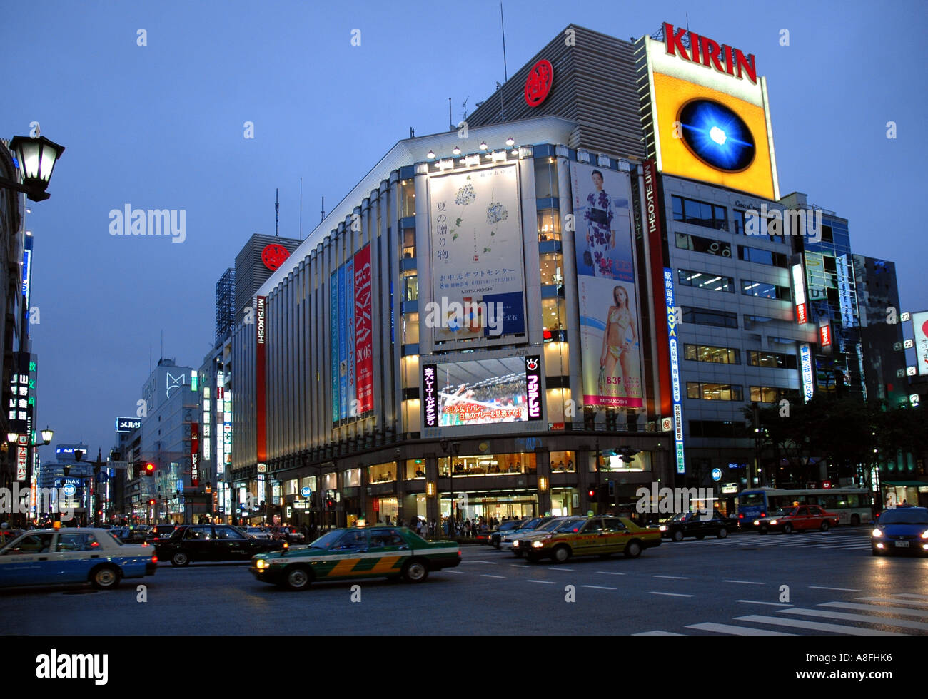 Bright Lights on Ginza Shopping District in Tokyo Japan Stock Photo