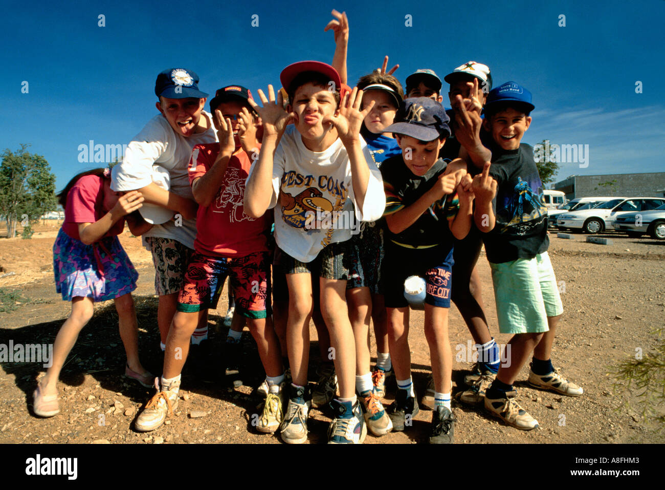 a group of school children showing off, Alice Springs, Australia Stock Photo
