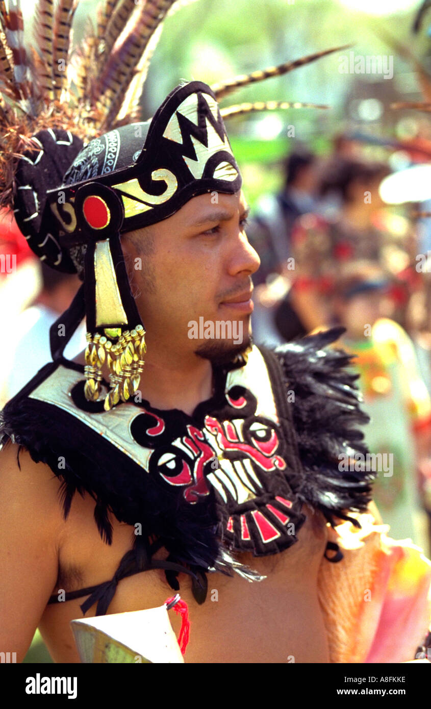 Indigenous Aztec Indian performing in ceremonial costume age 28. Heart of the Beast May Day Festival Minneapolis Minnesota USA Stock Photo
