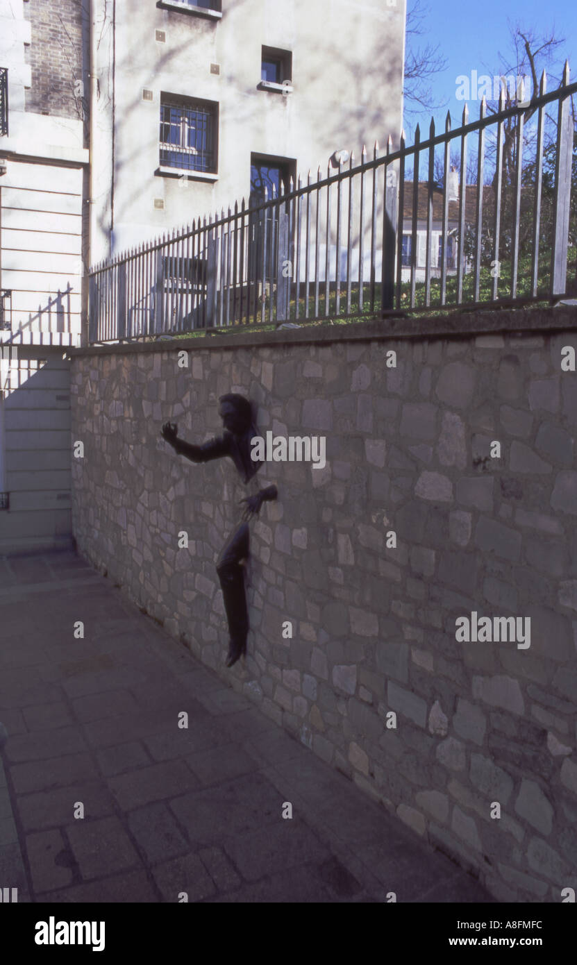 Man walks through wall shock, Montmartre, Paris Stock Photo