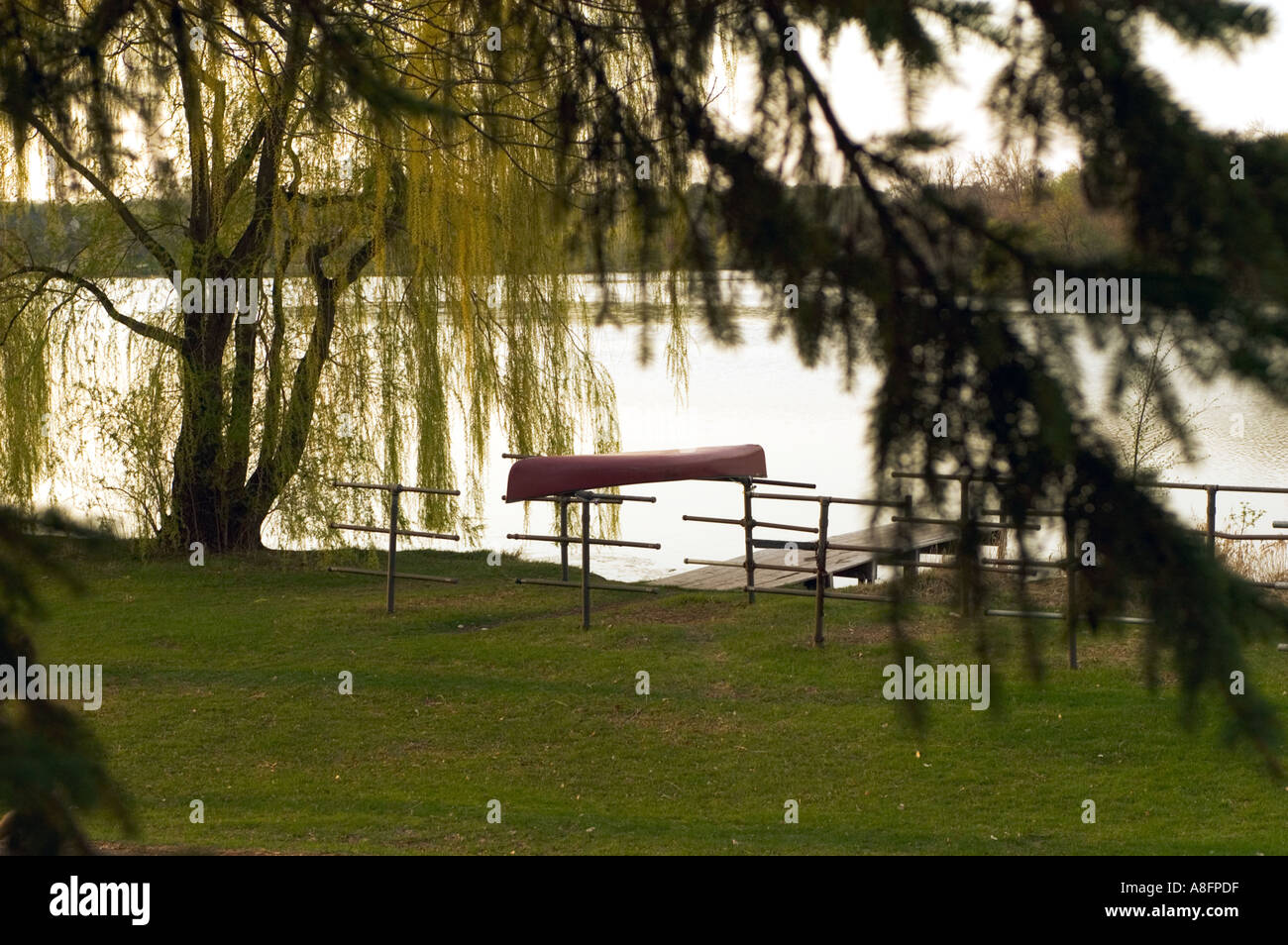First canoe on rack Lake of the Isles Minneapolis Stock Photo Alamy
