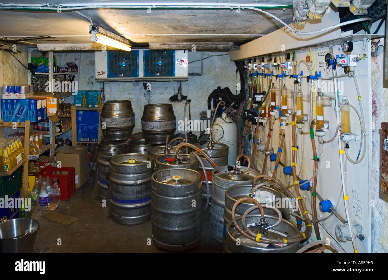 Inside a pub cellar showing barrels, casks and piping. Humberside Stock