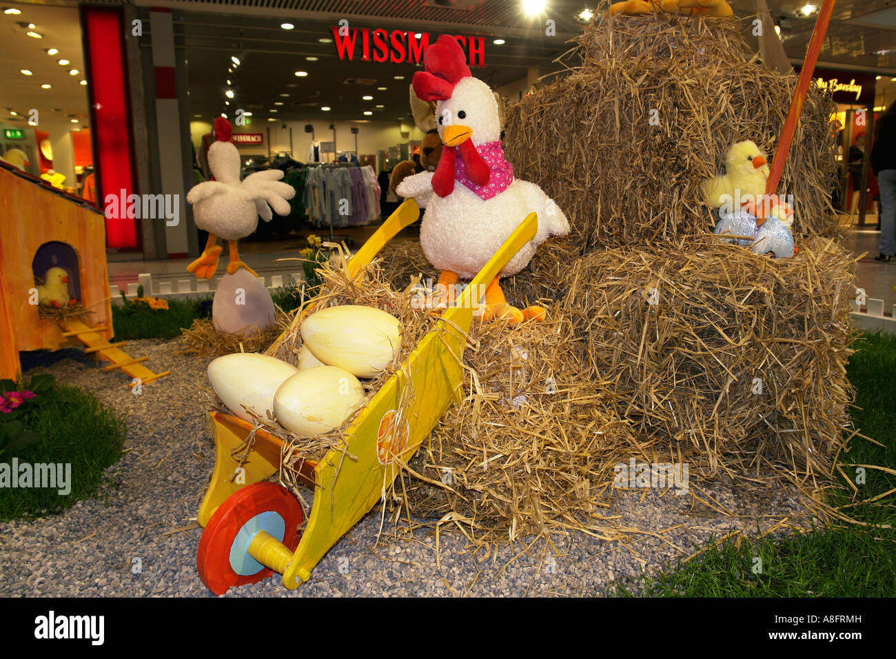 Easter hen pushing eggs Stock Photo Alamy