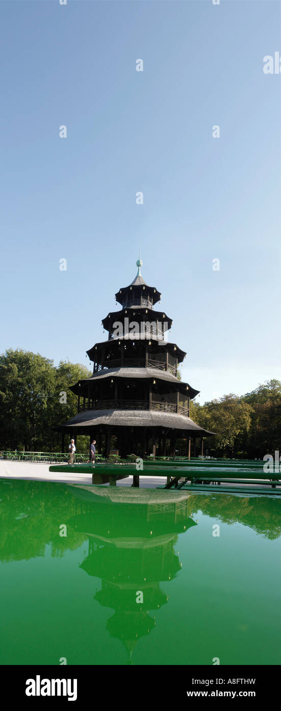 Panorama Chinese tower with water reflection at English garden Munich Bavaria Germany Stock Photo