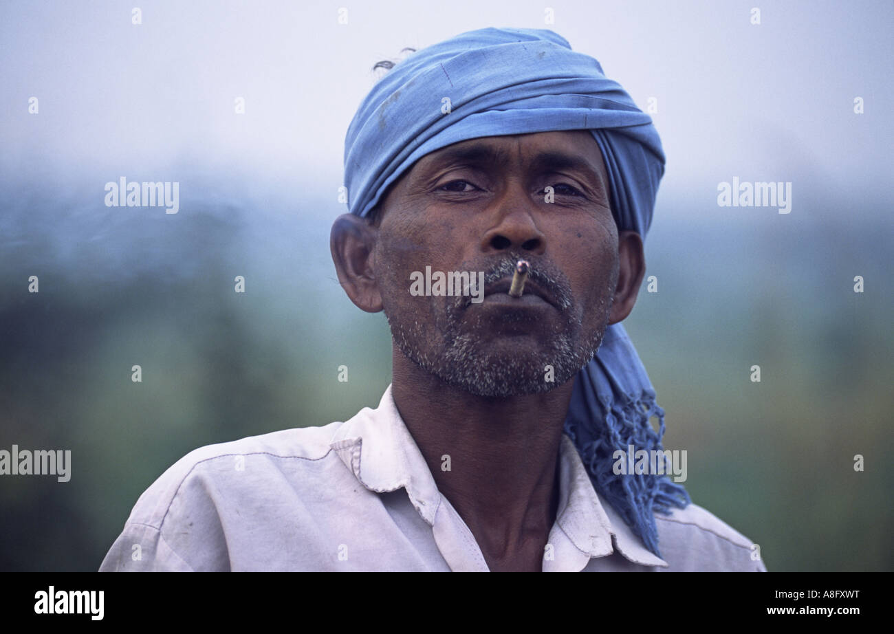 Indian man near Gaul, West Bengal, India. Smoking a Bidi Stock Photo