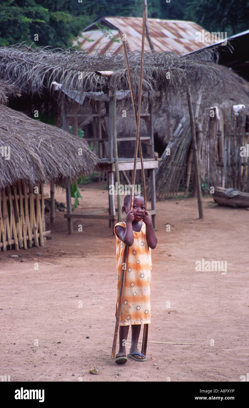 Young African girl in rural village. Volta Region, Ghana, West Africa. Stock Photo