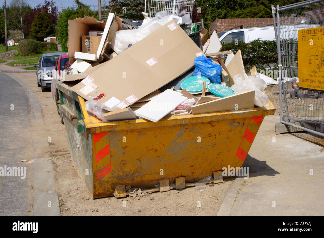 skip full of rubbish Stock Photo Alamy