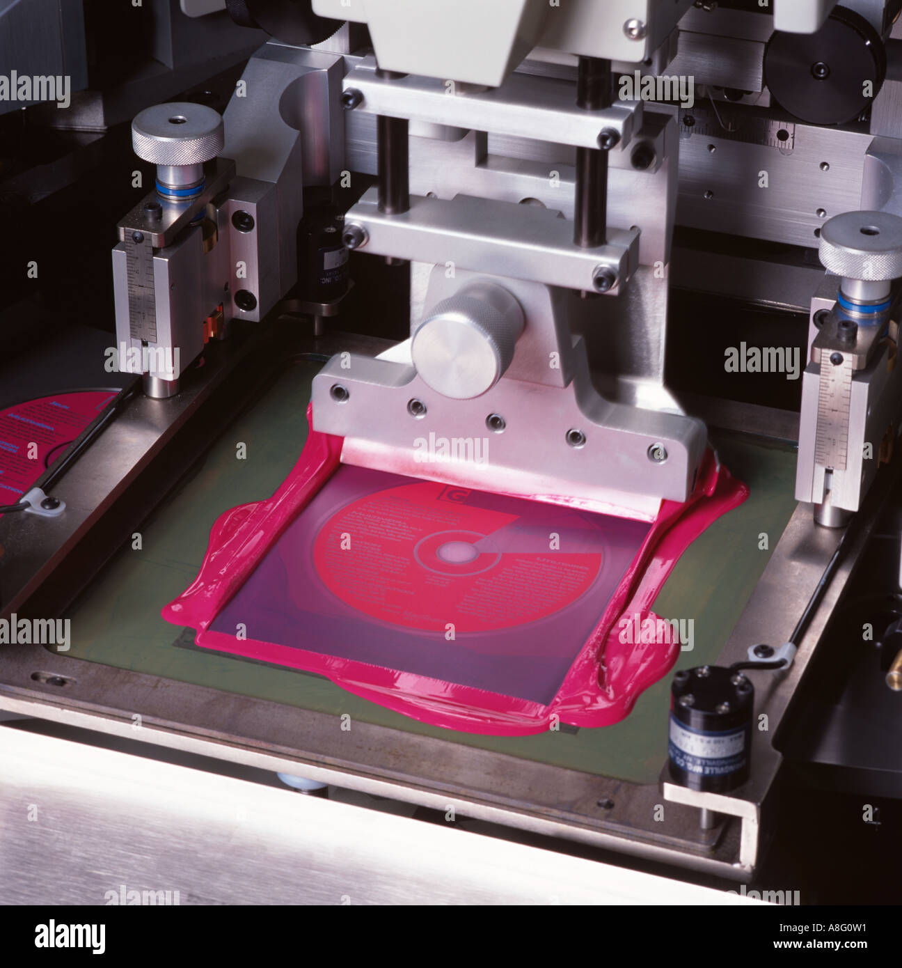 Silk Screen Printing on to Compact Discs Stock Photo Alamy