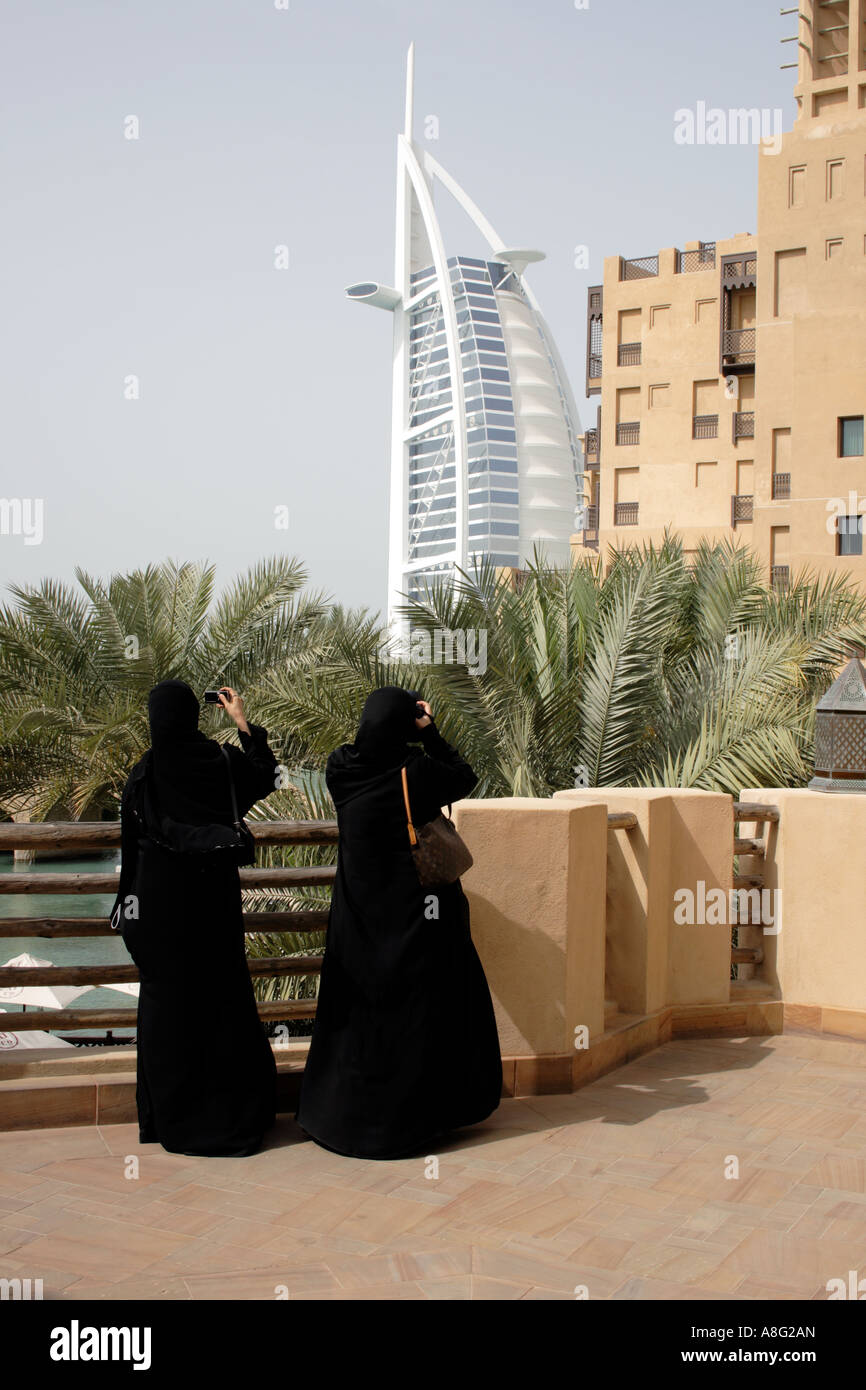 two women, traditional black dress (burka) taking photo of hotel Burj al Arab Madinat Jumeirah, Dubai. Photo by Willly Matheisl Stock Photo - Alamy two women, traditional black dress (burka) taking photo of hotel Burj al Arab Madinat Jumeirah, Dubai. Photo by Willly Matheisl Stock Photo - Alamy