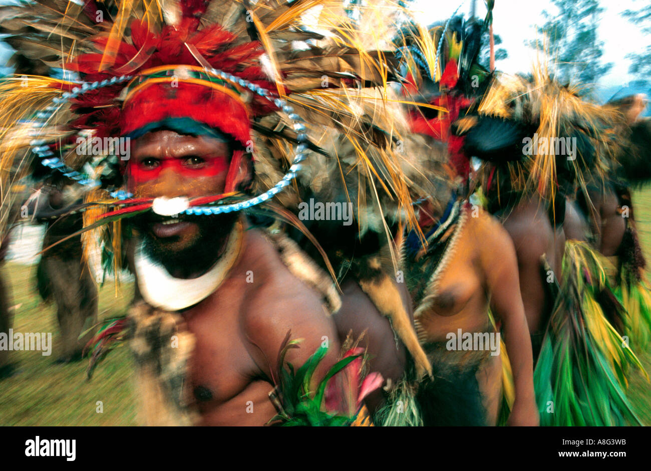 blurred decorated aboriginals dancing, Goroka, Papua New Guinea Stock Photo