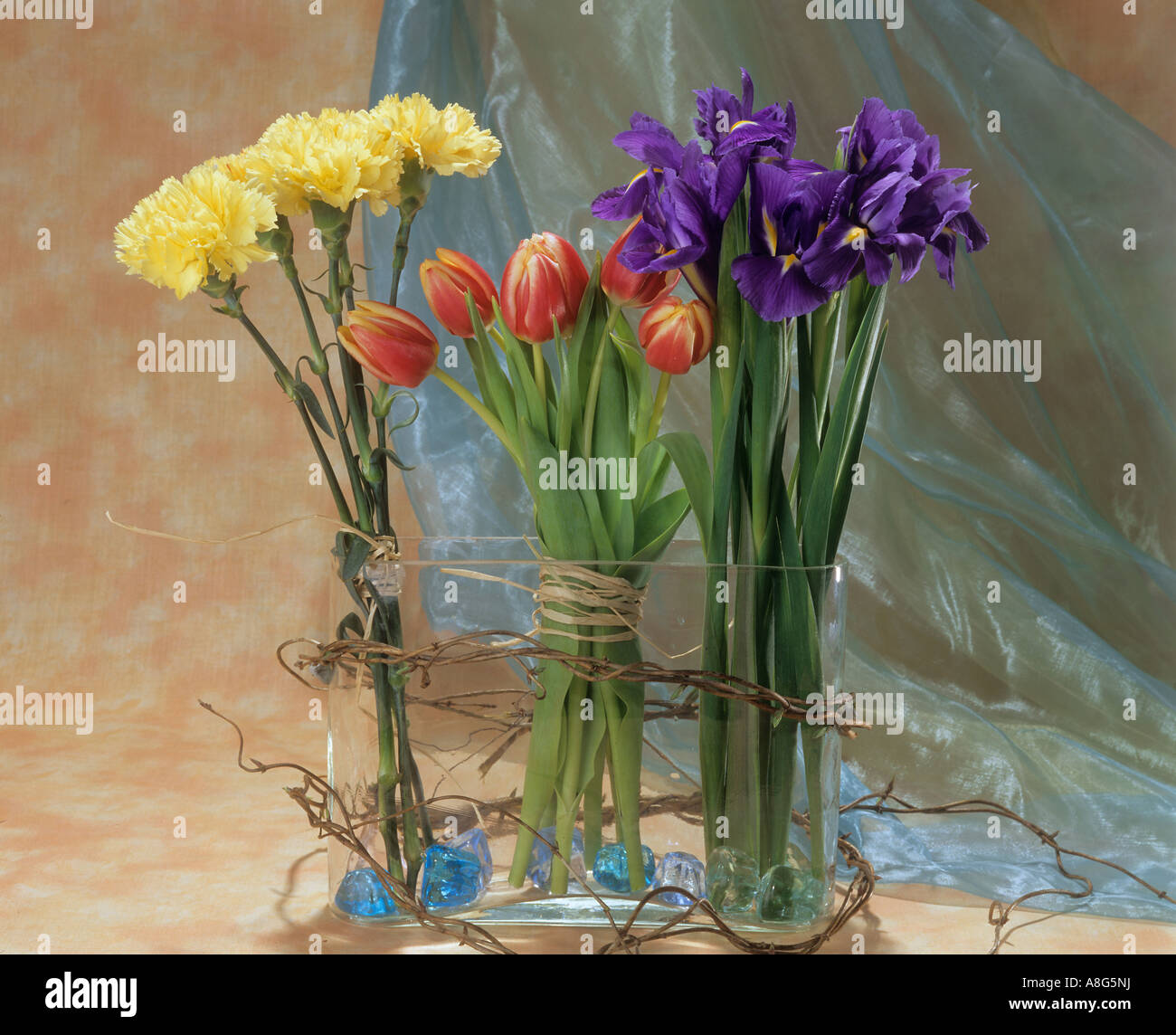bouquets with carnations , tulips and irises Stock Photo Alamy