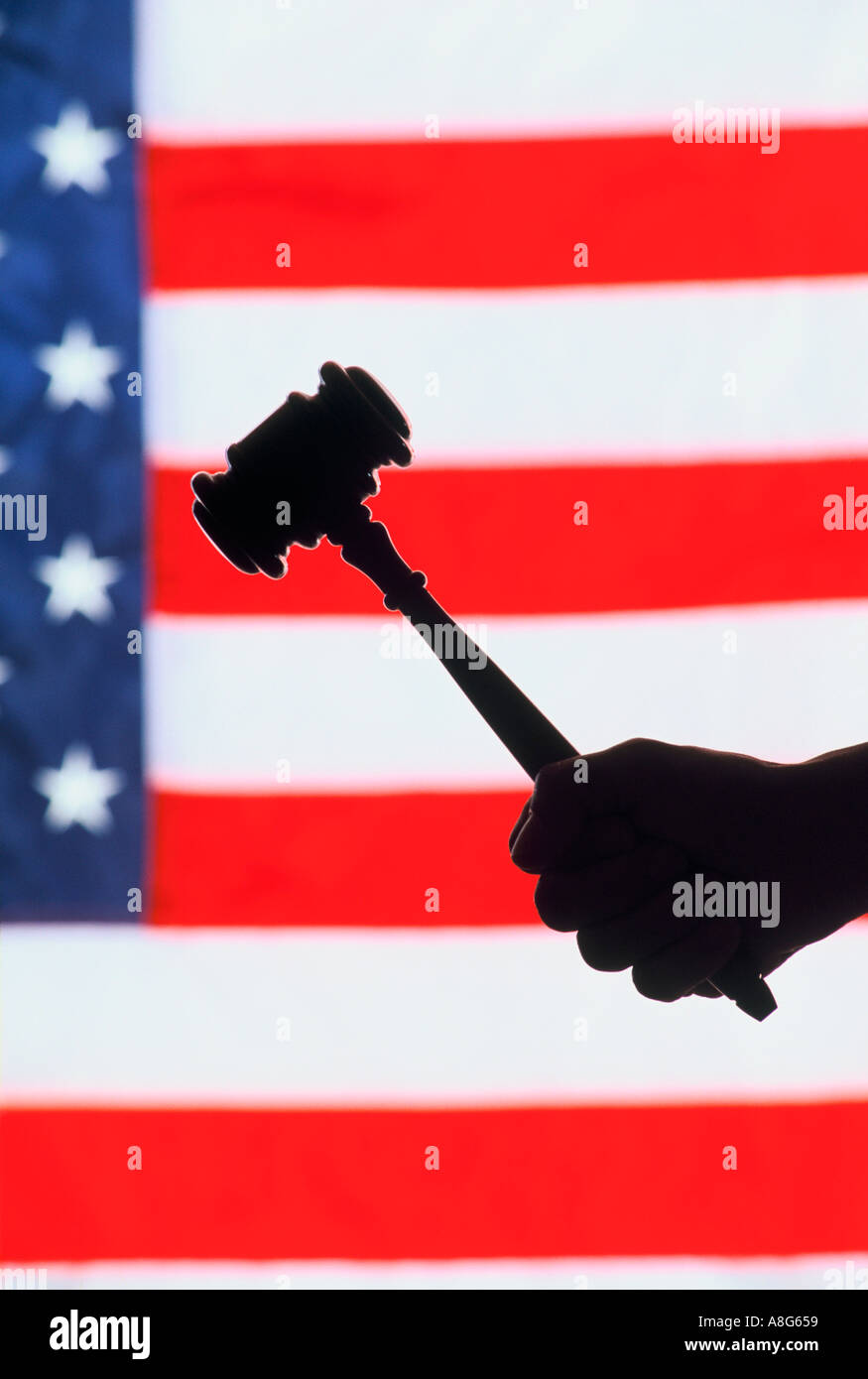 Hand with gavel coming down Stock Photo Alamy