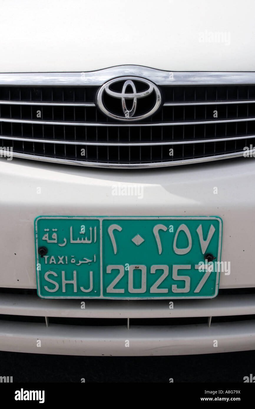 Toyota taxi car with Sharjah car license plate, United Arab Emirates. Photo by Willy Matheisl