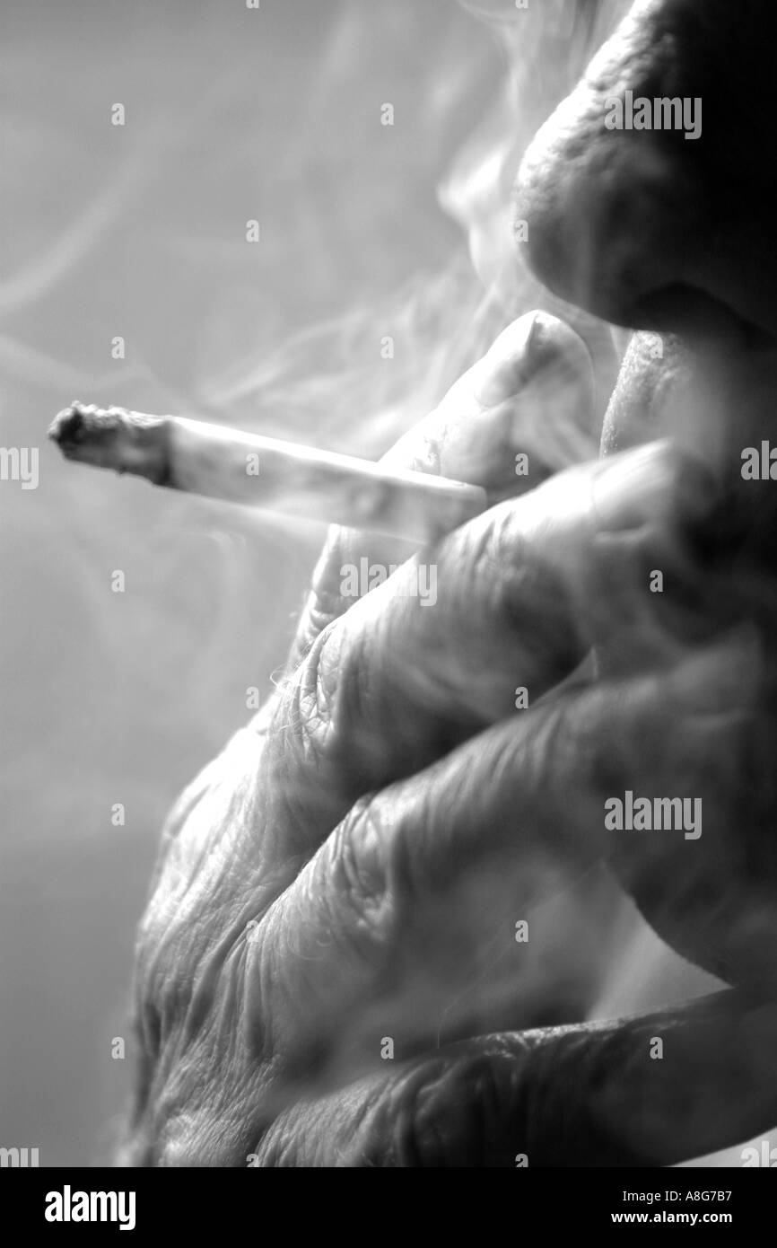 Heavy cigarette smoker Black and White Stock Photos & Images