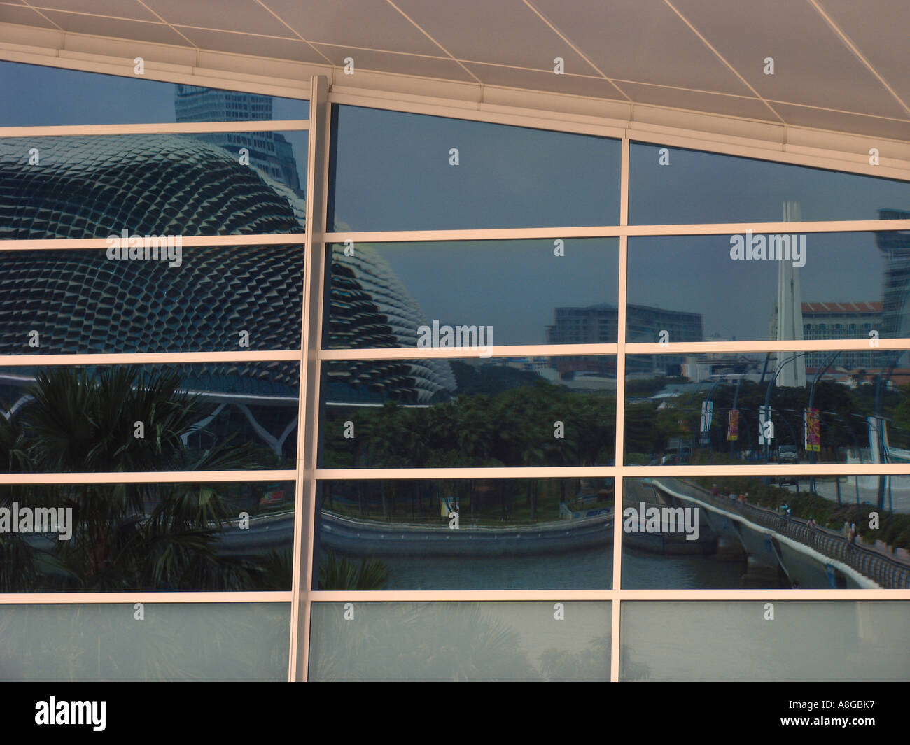 Reflexions of the esplanade and the arts centre in glass facade Singpore Stock Photo