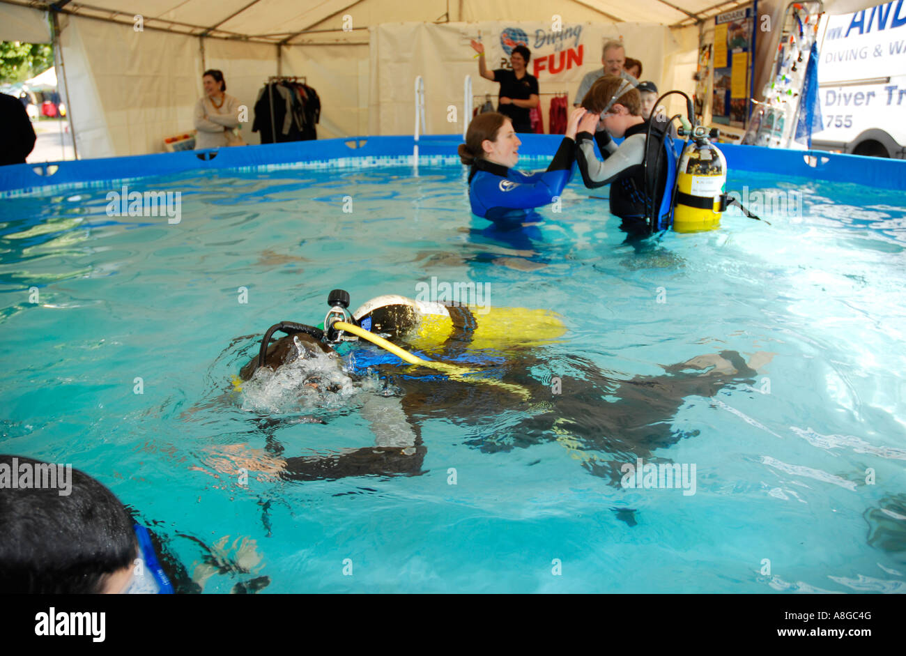 Boy taking scuba diving lessons Stock Photo Alamy