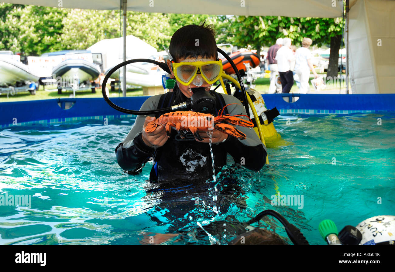 Boy taking scuba diving lessons Stock Photo Alamy