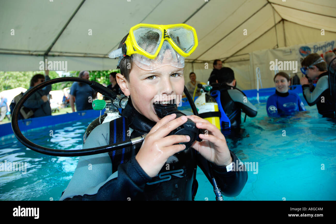 Boy taking scuba diving lessons Stock Photo Alamy