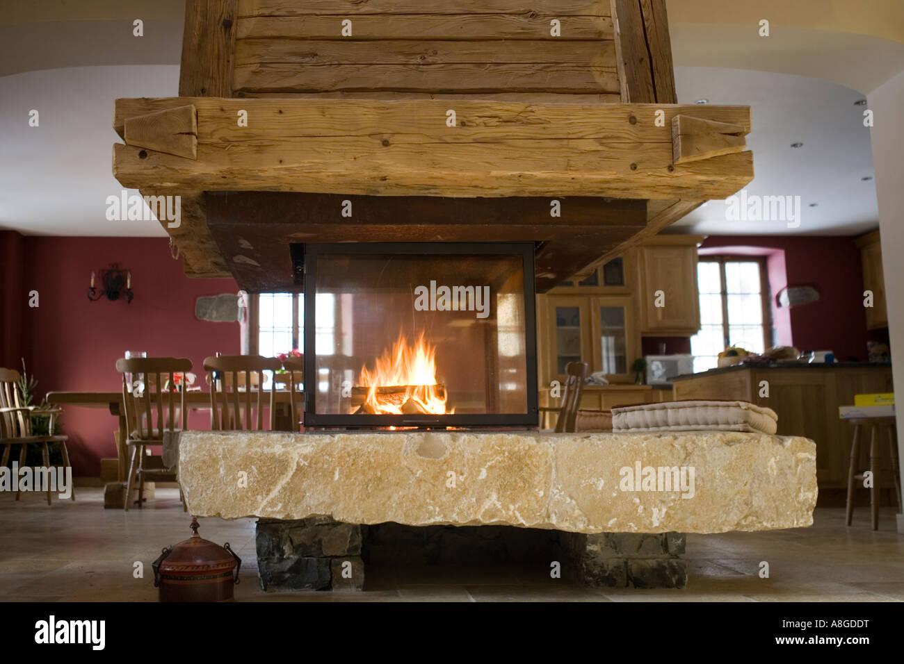 Fireplace and chimney in chalet Haute Savoie Rhone Alpes France Stock Photo