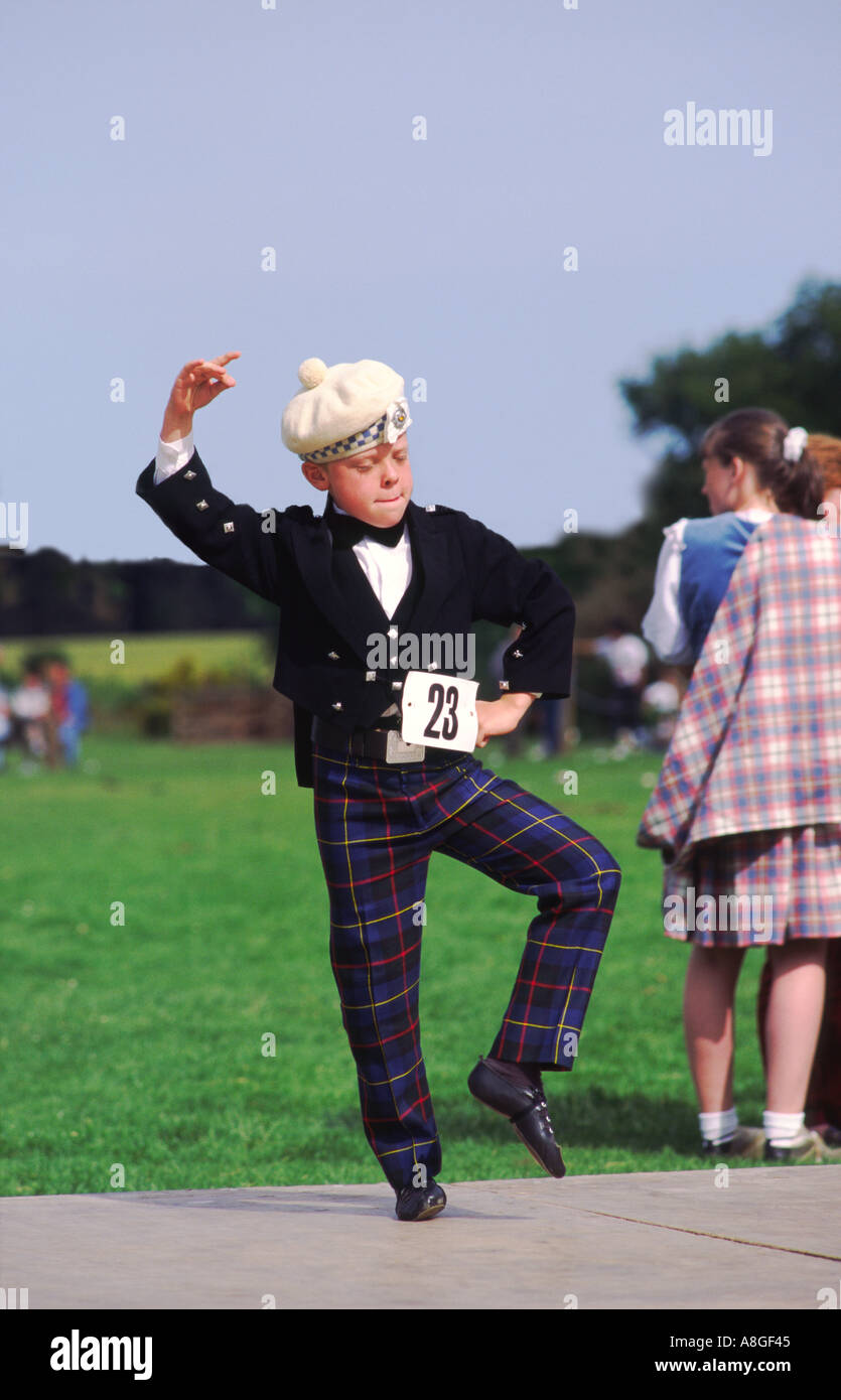 Highland dancing. Boy in traditional costume dancing a hornpipe at the annual highland games at Echt, Grampian region, Scotland Stock Photo