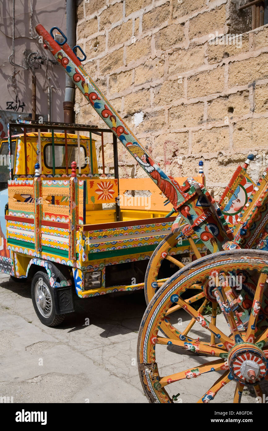 Piaggio Ape decorated in traditional manner by Sicilian artist and painter Franco Bertolino Palermo Sicily Italy Stock Photo