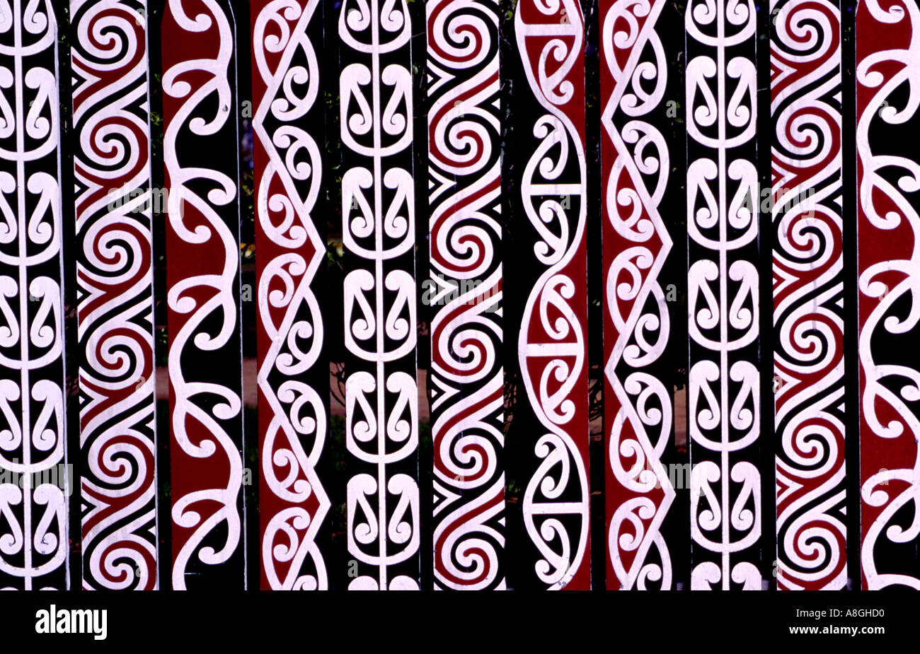 Traditional Maori design pattern on fence posts Rotorua New Zealand