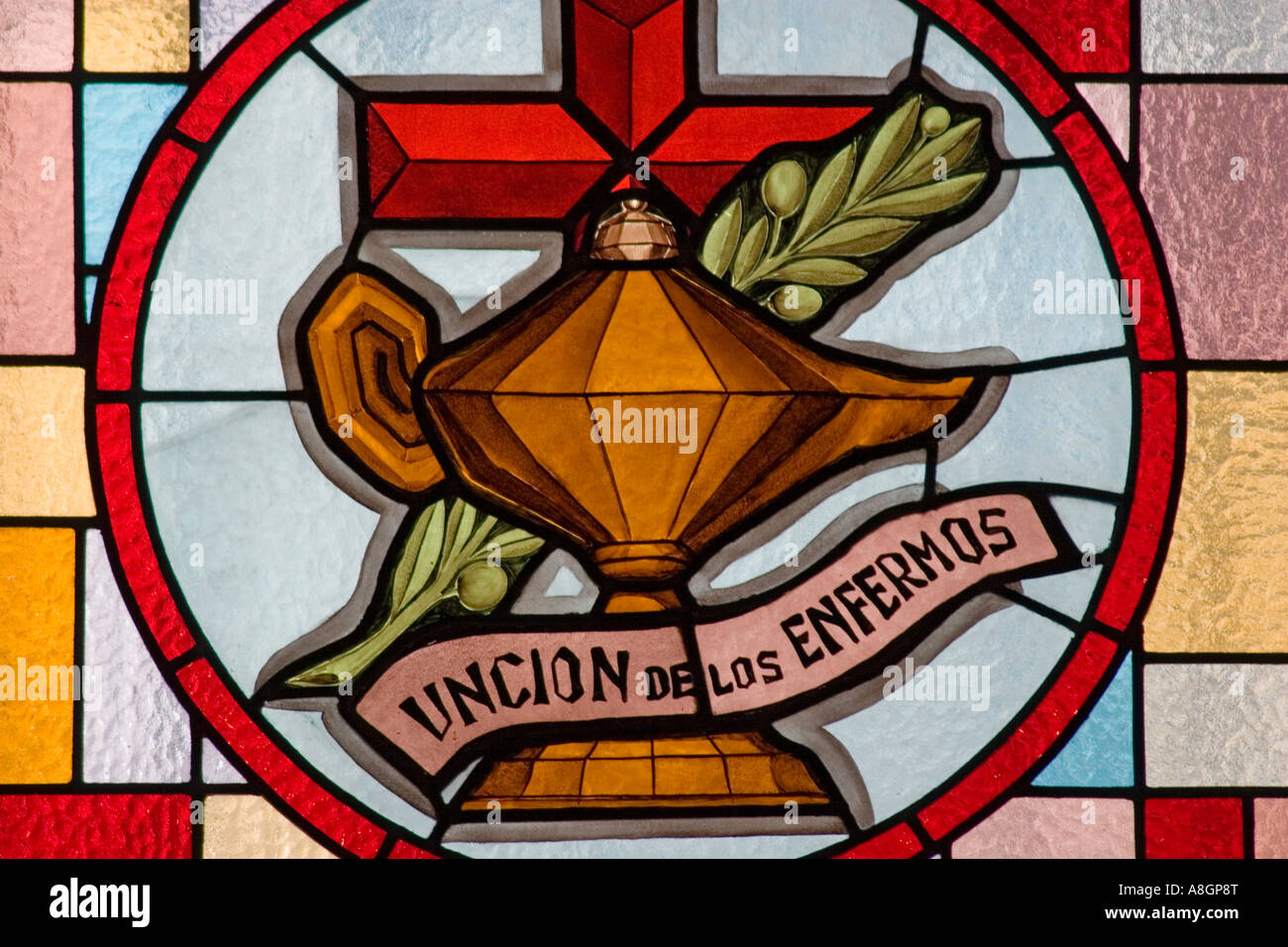 allusive show window to the sacrament of the unction of the patients in a church catholic religion Stock Photo