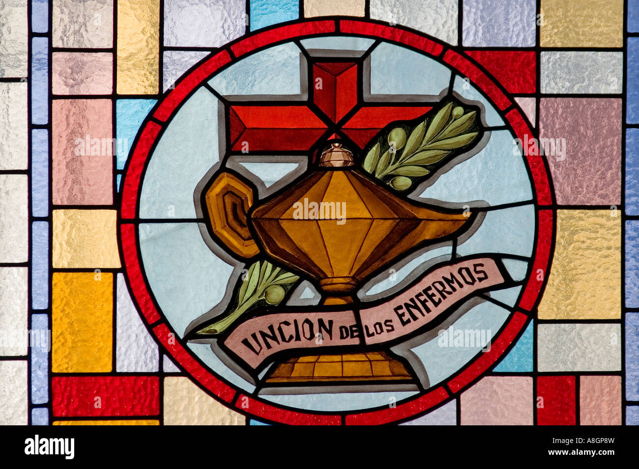 allusive show window to the sacrament of the unction of the patients in a church catholic religion Stock Photo