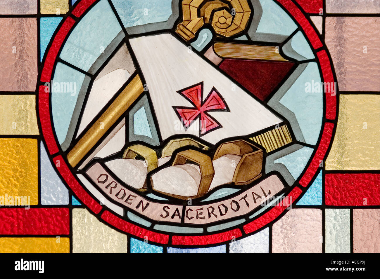 allusive show window to the sacrament of the sacerdotal order in a church catholic religion Stock Photo
