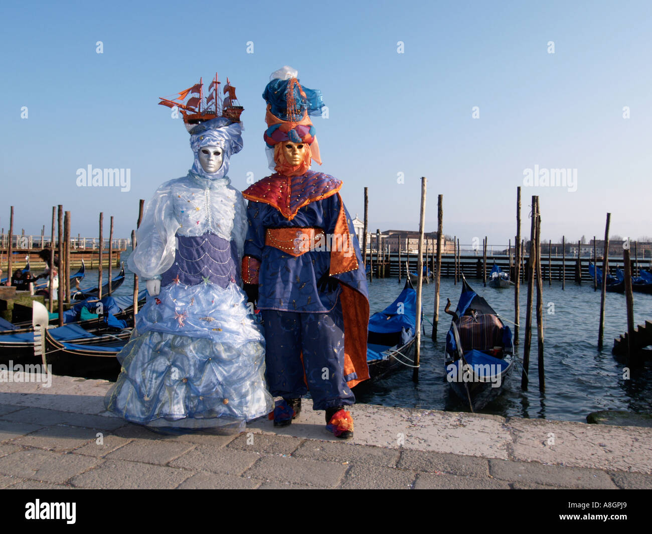 two people wearing costumes at Venice carnival Stock Photo - Alamy
