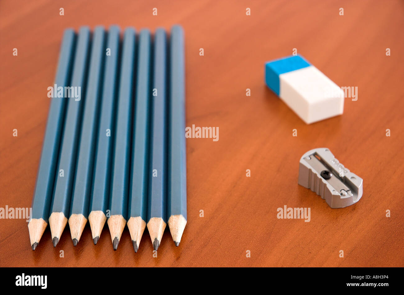 Pencils sharpener and eraser on school desk Stock Photo Alamy