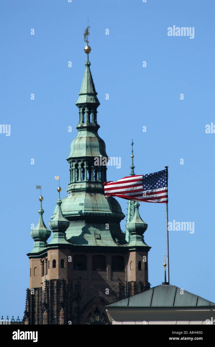Waving US Flag in front of St Vitus’ Cathedral in at Prague Castle, Czech Republic Stock Photo