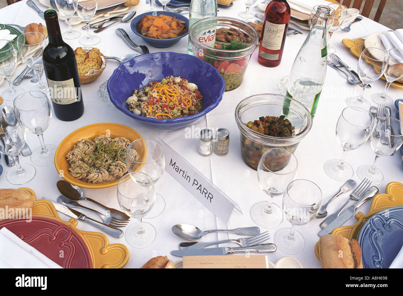 Martin Parr Magnum photographer table setting at dinner party Arles France HOMER SYKES Stock Photo