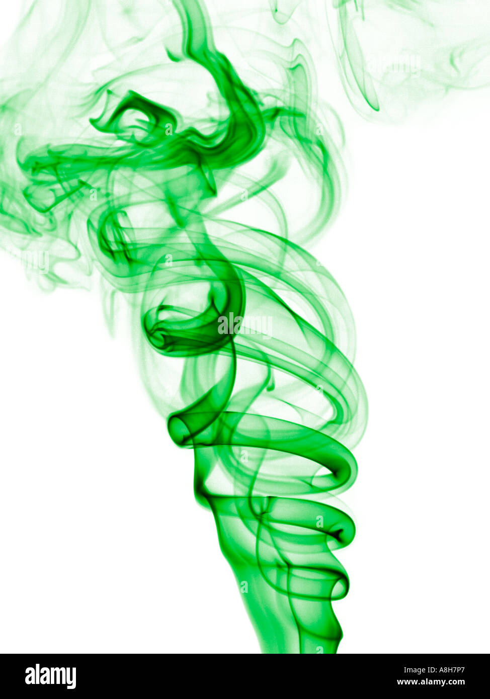 Colorized incense smoke trails on a white background Stock Photo