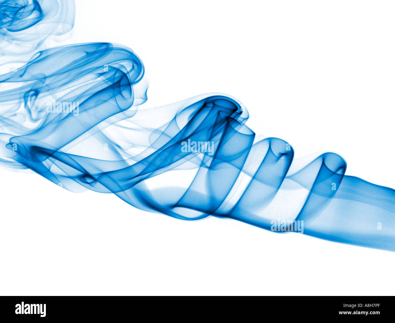 Colorized incense smoke trails on a white background Stock Photo