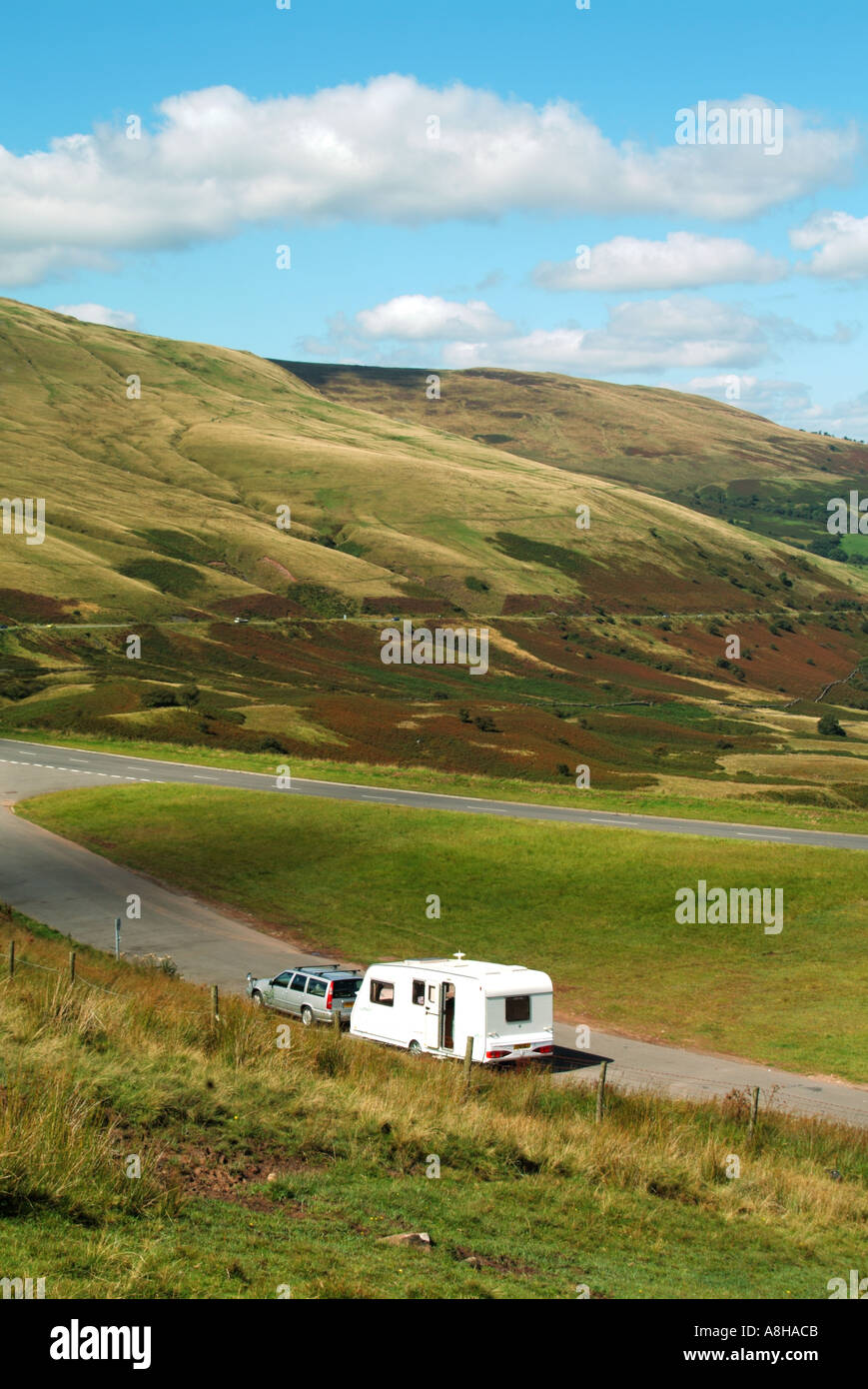 Caravan & Volvo tow car parked in long layby on A470 scenic road in ...
