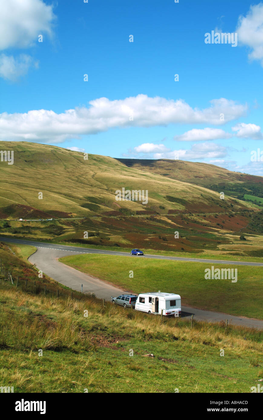 Caravan & Volvo tow car parked in long layby on A470 scenic road in ...