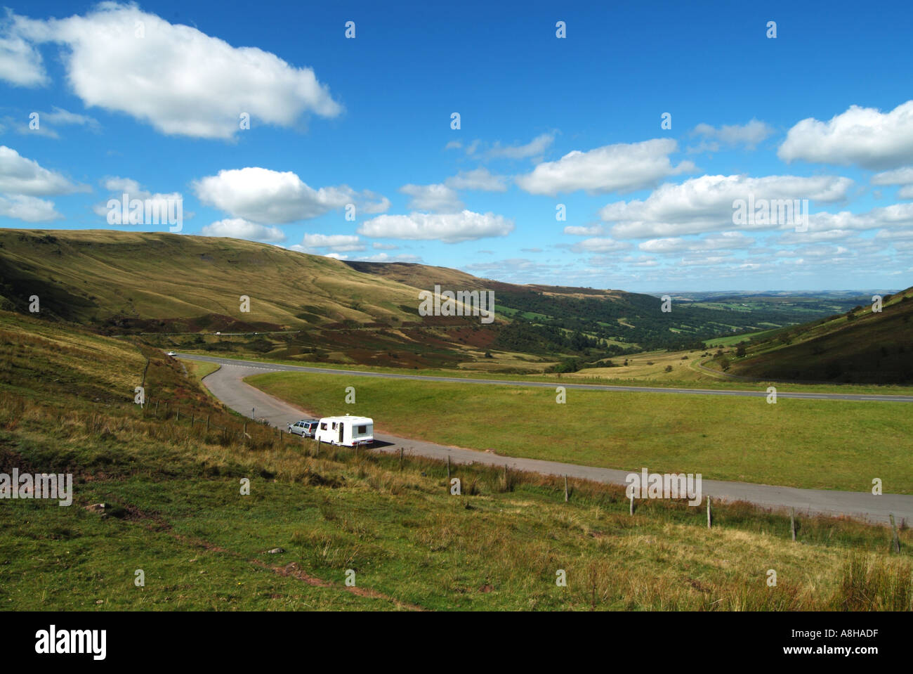 Caravan & Volvo tow car parked in layby on A470 scenic road below big ...