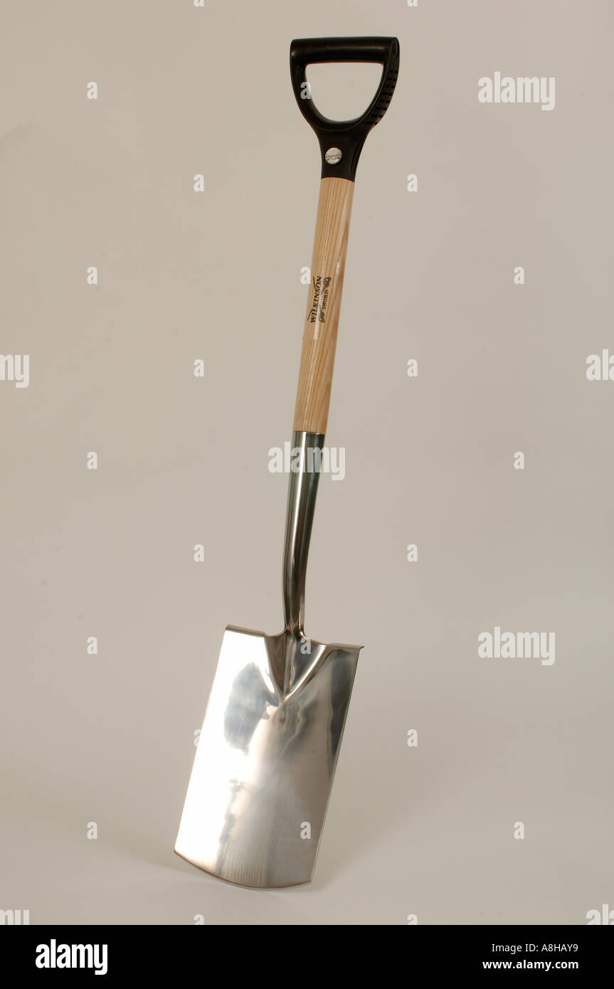 Stainless steel spade on a white plain background Stock Photo