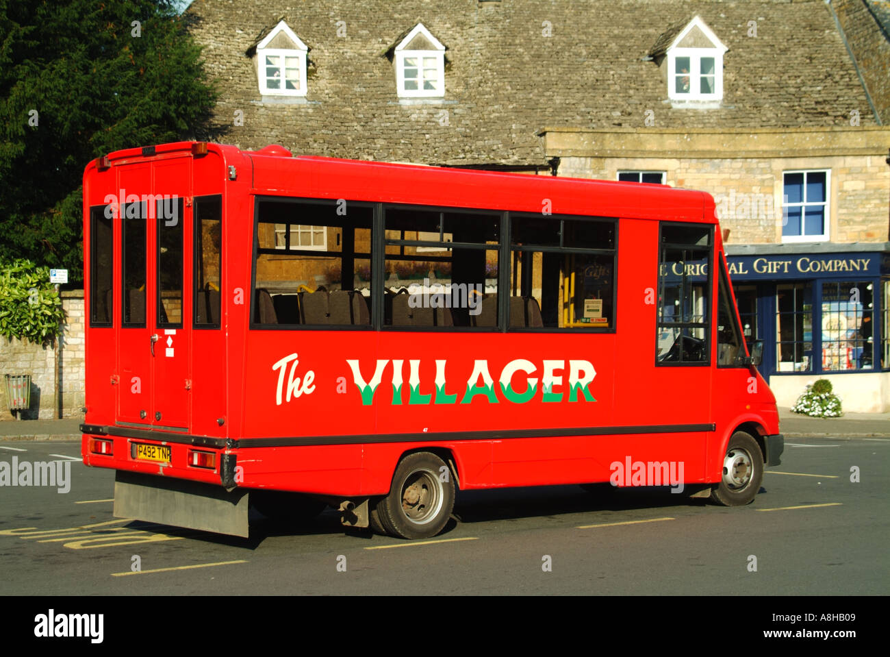Stow on the Wold villager bus stationary awaiting passengers Stock