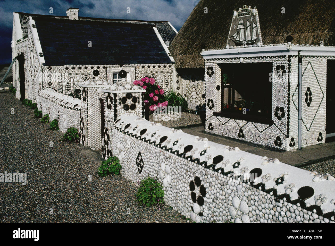 The late Kevin French created this  highly decorated house  with Sea Shells  Cullenstown  Co Wexford  Ireland Stock Photo