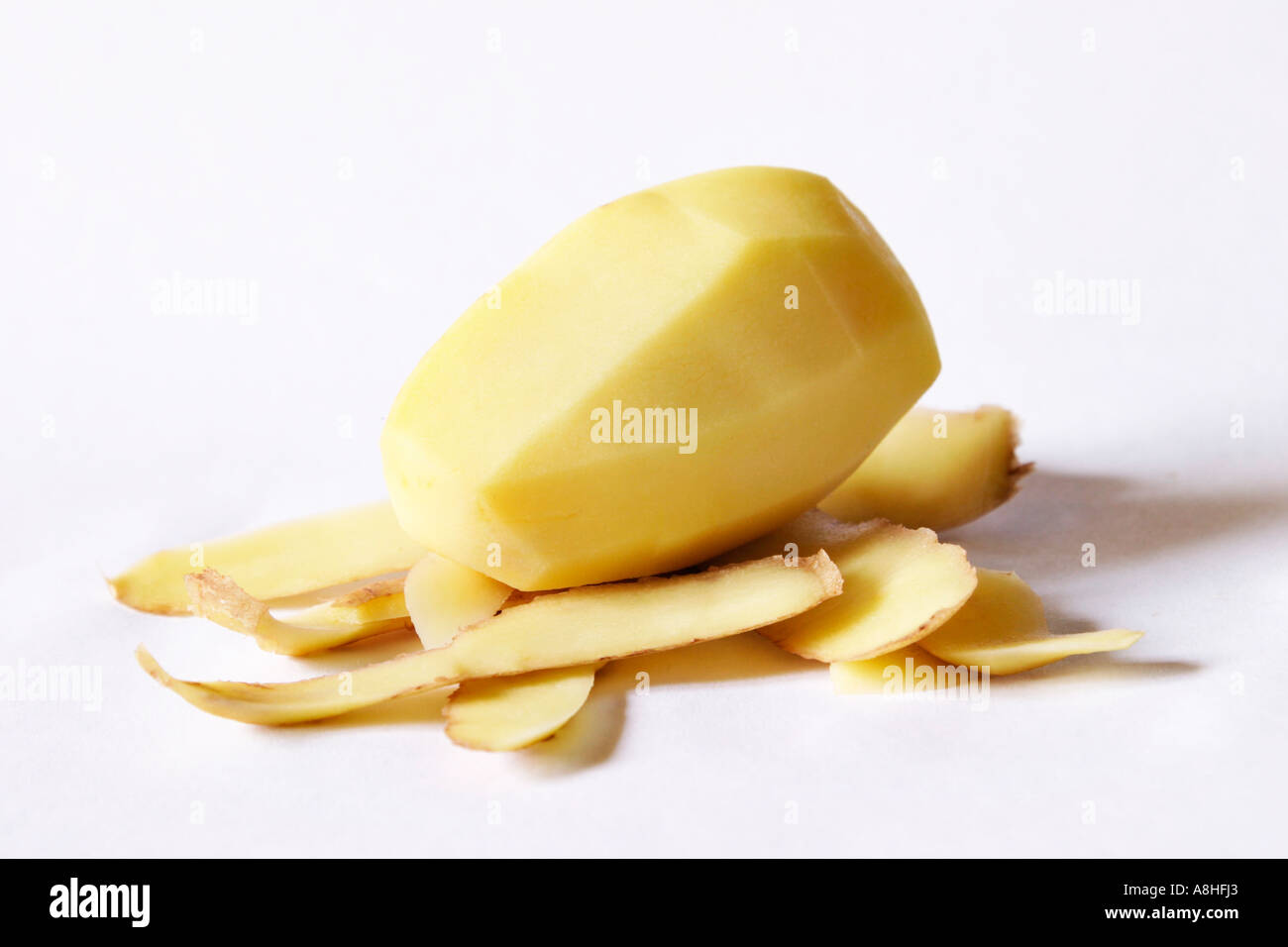 Peeled potatoes Stock Photo