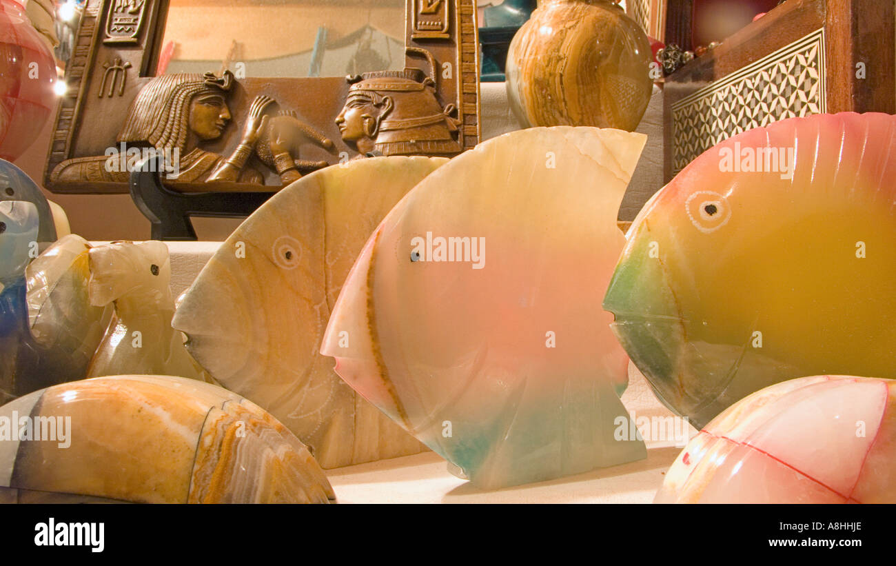 Egyptian souvenirs including stone eggs fish and representations of antiquities EgyptRed Sea Coast Sinai Egypt Stock Photo