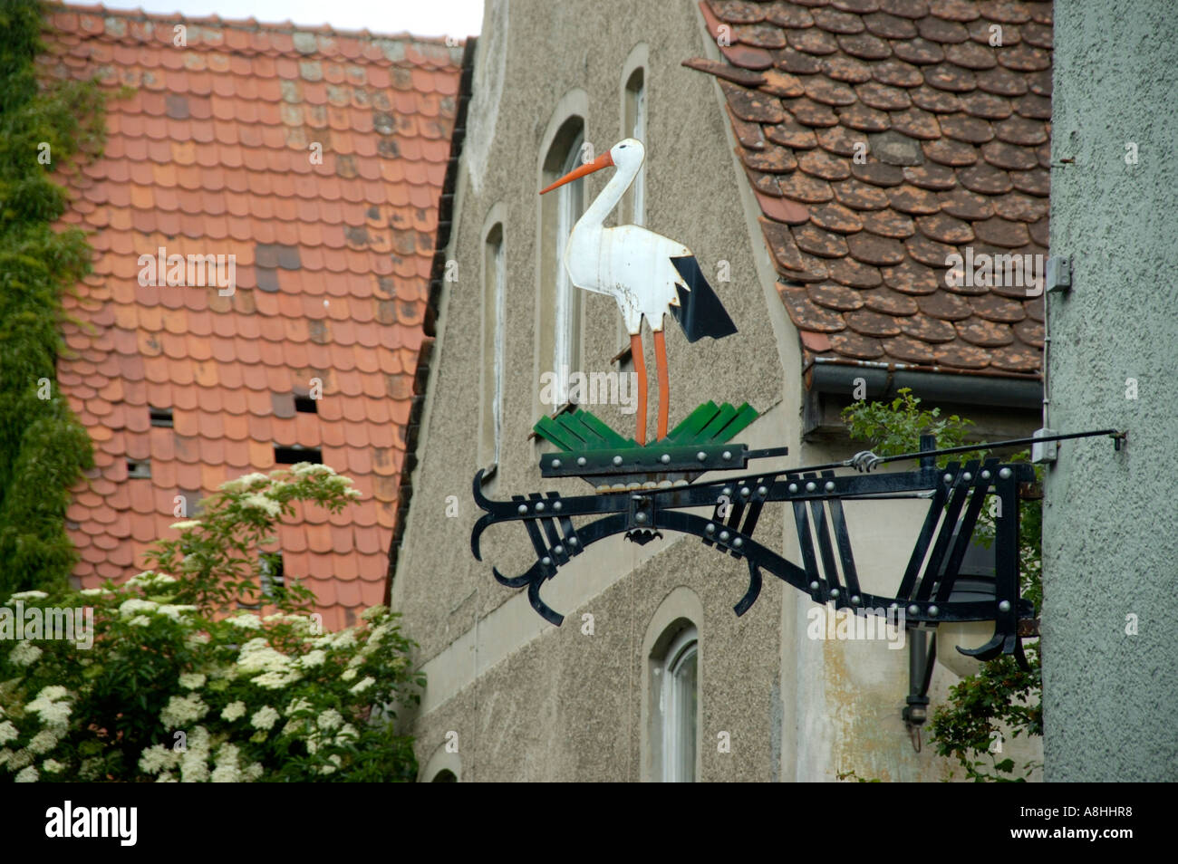 Iron made restaurant sign with a stork Ingolstadt Bavaria Germany Stock Photo
