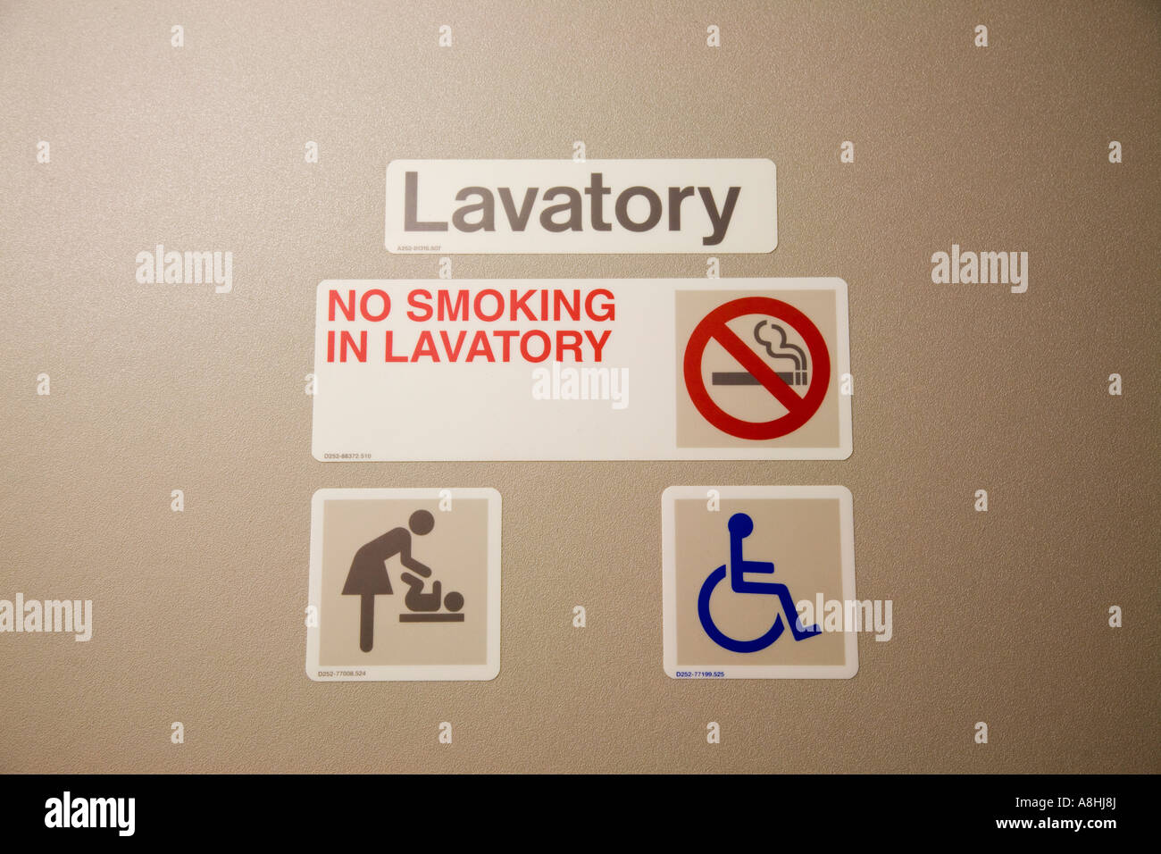 Pictogram on toilet door lavatory inside airplane Stock Photo