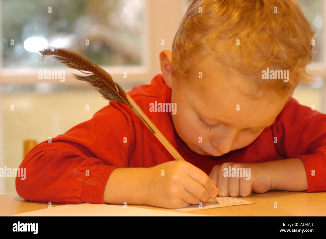 five-year-old-boy-writing-stock-photo-alamy