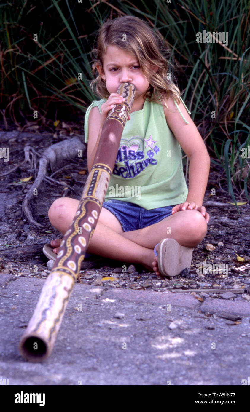 Young Australian playing the didgeridoo at the Eumundi Markets
