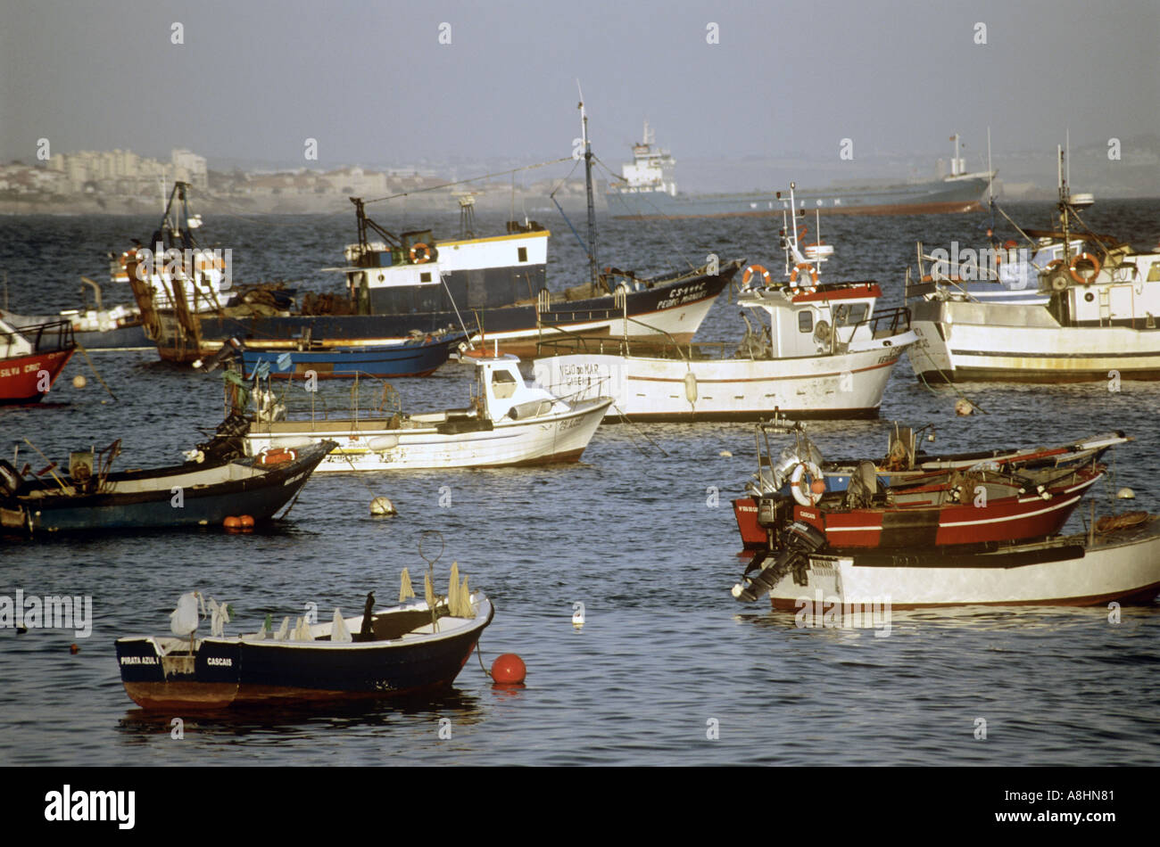 Fishing boats moored in port hi-res stock photography and images - Alamy